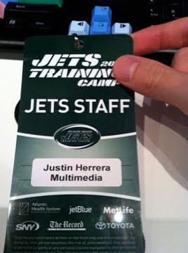 A Jets Training Camp laminate reading JETS STAFF, Justin Herrera, Multimedia.