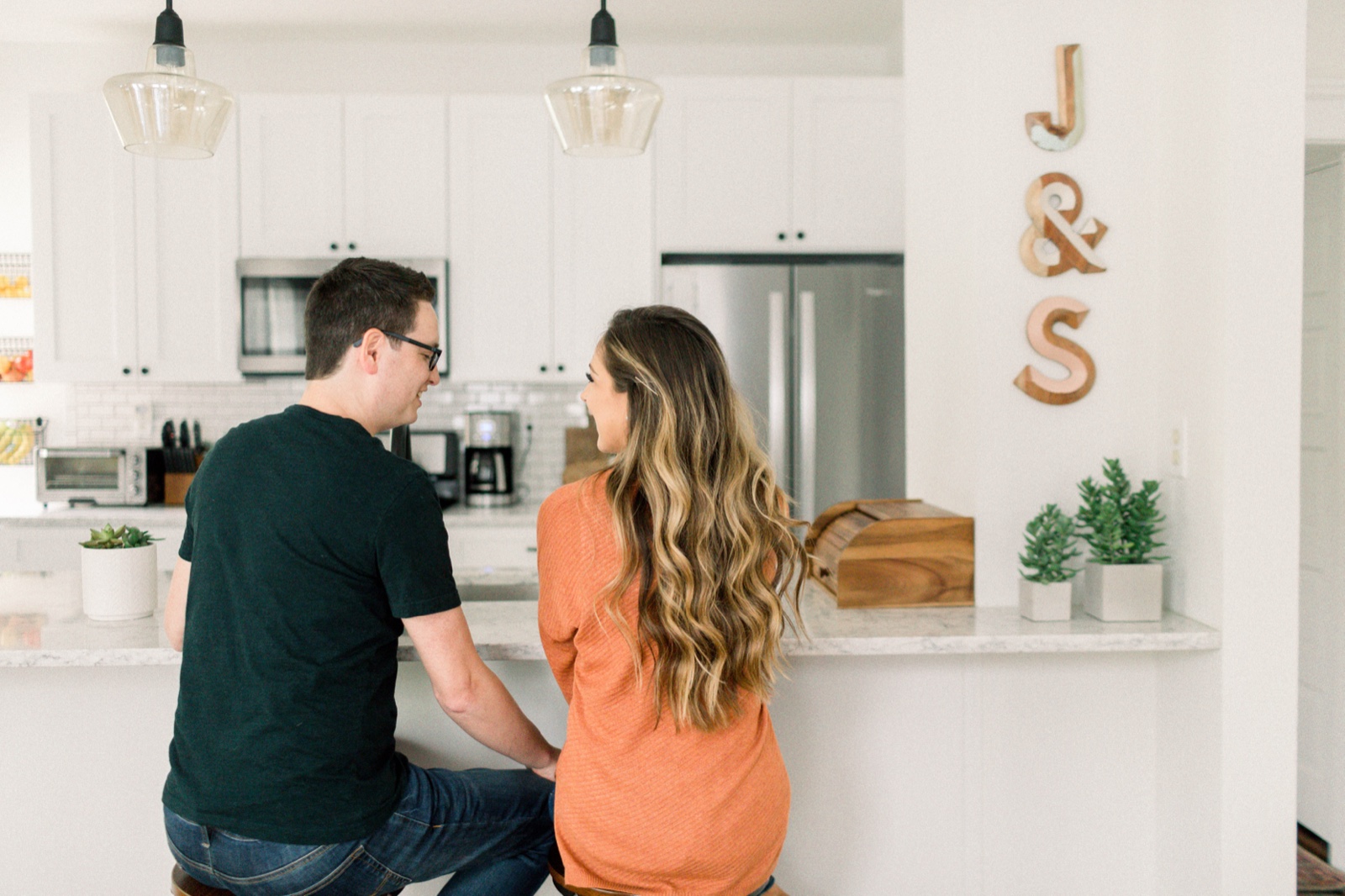 Justin and Steph Herrera in their Western Ave kitchen